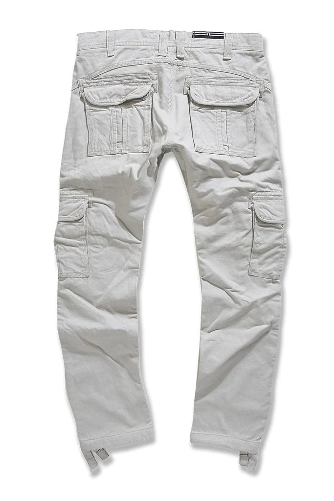 Jordan Craig Xavier OG denim cargo pants with multiple pockets and relaxed fit, styled in classic blue denim fabric.