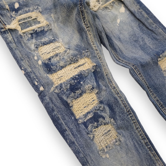 Evolution Kids bleached distressed denim for kids, light tint with ripped and frayed details, stylish and casual kids denim jeans