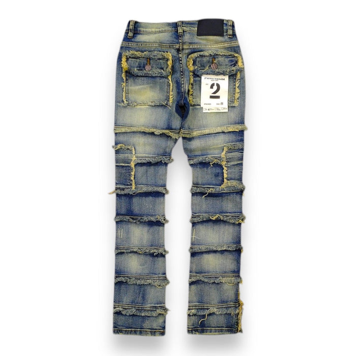 FWRD Kids Patchwork Stacked Denim jeans in light tint, showcasing colorful patchwork design and stacked style detailing.
