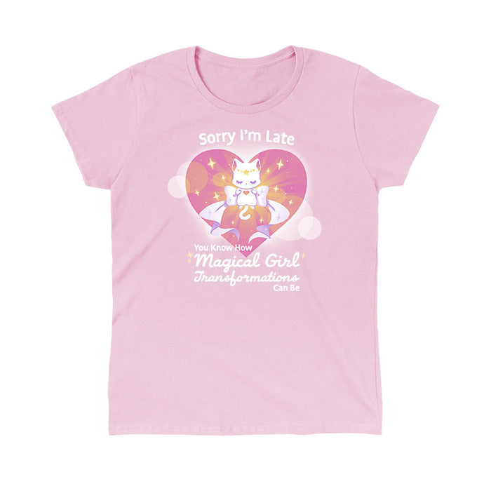 Classic Cotton T-shirt_TeeTurtle light pink Magical Girl Transformations apparel featuring a cat floating in a heart with a large bow and sparkles like classic anime girl. Captions says, "Sorry I'm late, you know how magical girl transformations can be".