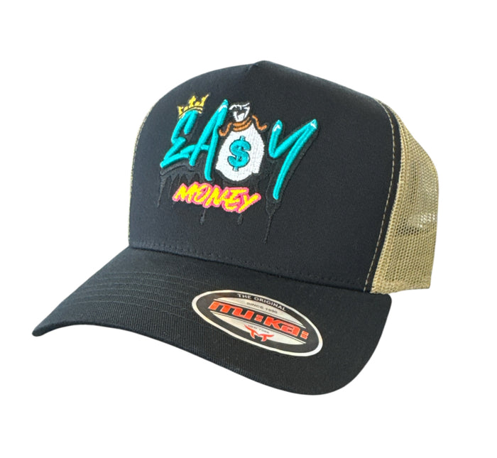 Black MUKA 'EA$Y Money' trucker hat with mesh back and adjustable snap closure, featuring bold white logo embroidery.