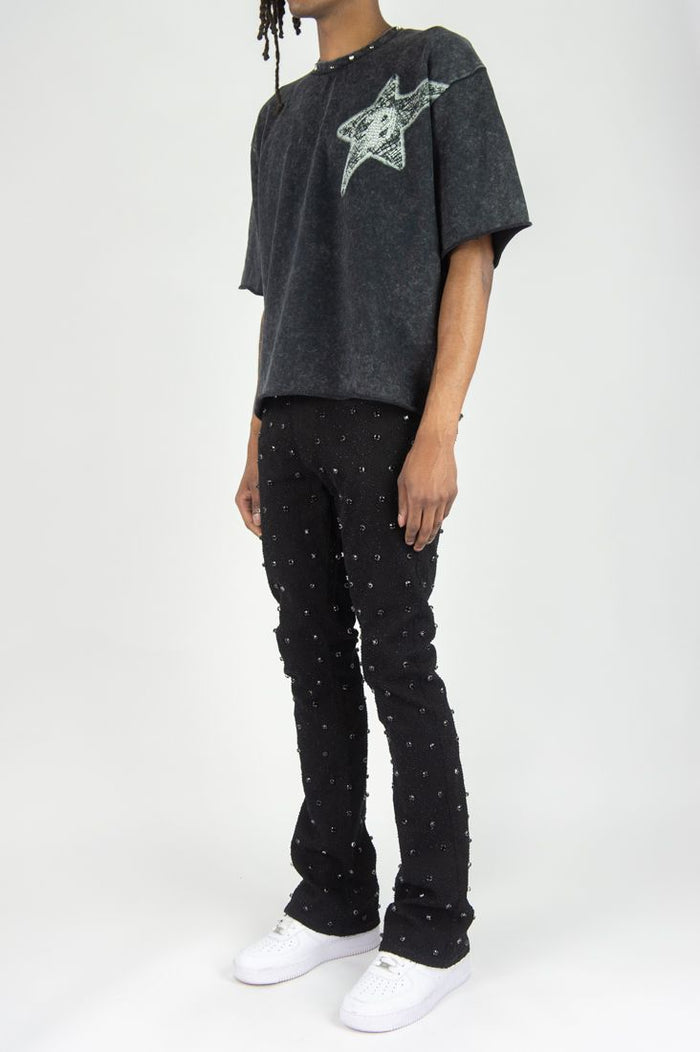 Rebel Denim Diamond Stacked Flare Denim in black, featuring a fitted waist and flared leg design.