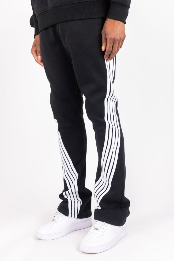 Rebel Minds Five Stripes black and white stacked sweatpants with side stripe design, comfortable casual wear.