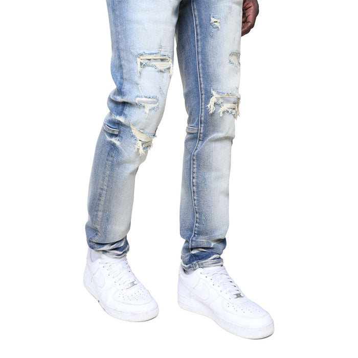 Smoke Rise vintage washed denim jacket in Fennel Blue, showcasing classic denim style and distressed details.