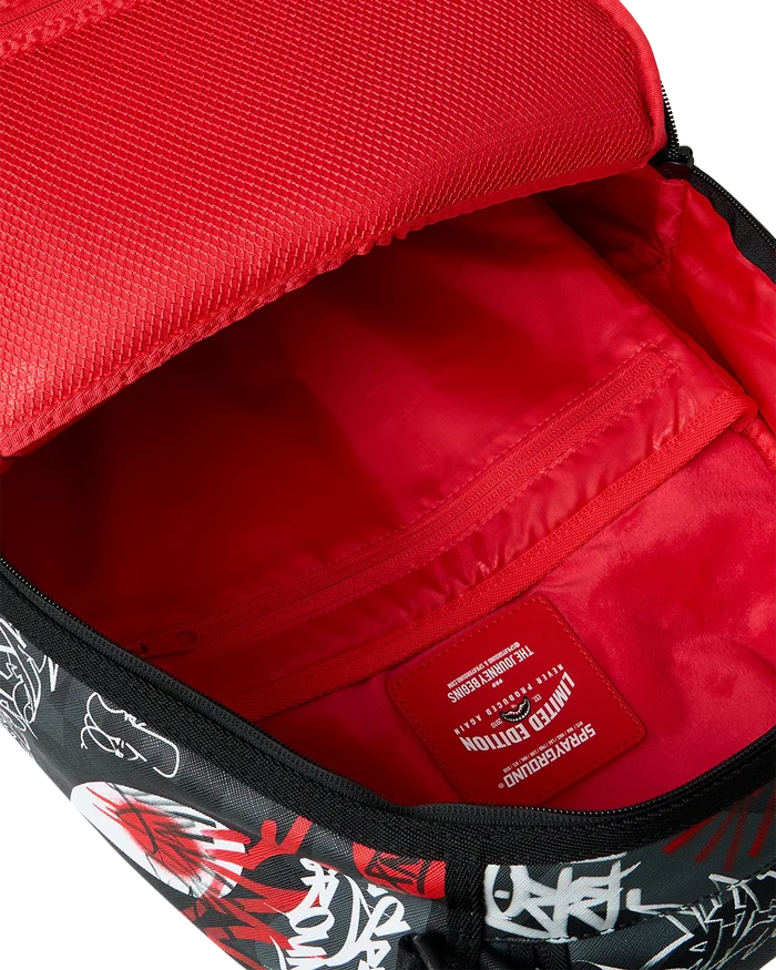 Sprayground Branded Bandit backpack in black with colorful graphic design, featuring multiple compartments and adjustable straps.