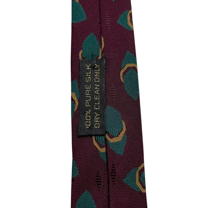 Giorgio Armani burgundy silk tie with geometric print and logo detail.