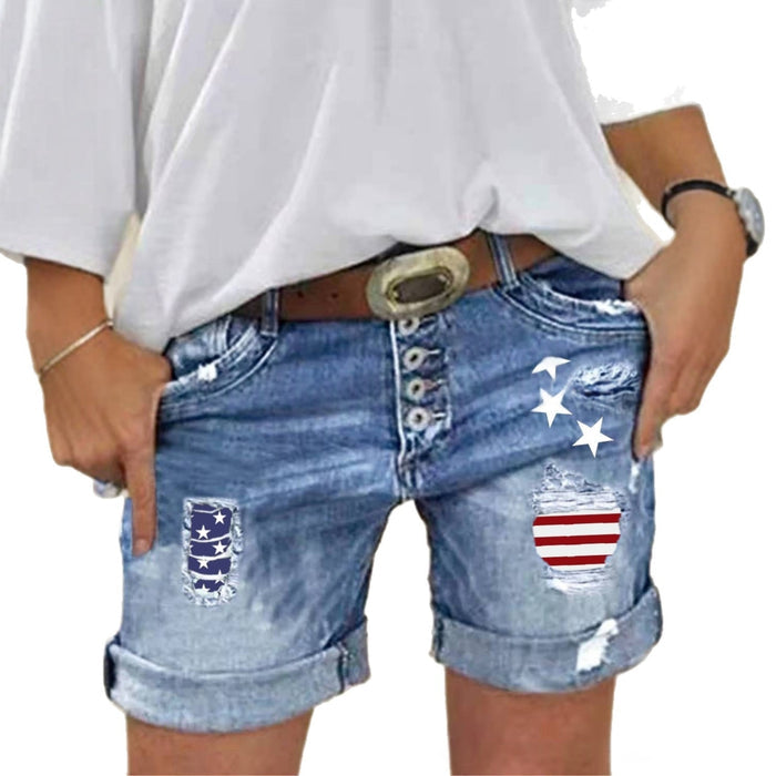 Women's cotton denim shorts in a clear product view, featuring moderate stretch, straight-leg shape and placed patch details.