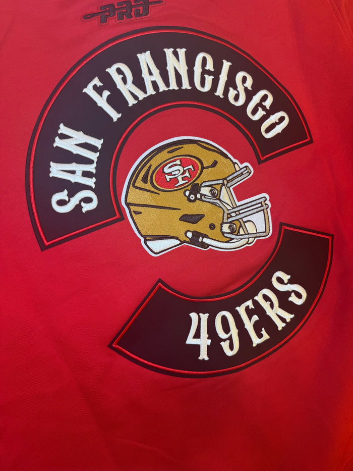 Red Pro Standard San Francisco 49ers hoodie with "Born For Sport" graphic, featuring team logo and comfortable hoodie design.