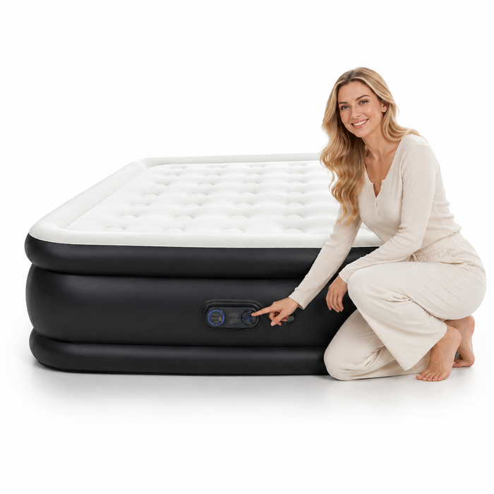 Air mattress with built in pump fully inflated in a guest room, showing the raised profile and wide sleeping surface for now.