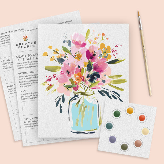 Floral painting kit with a completed artwork of flowers in a jar on a pink background.