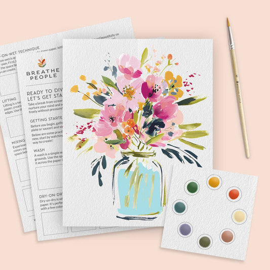 Floral painting kit with a completed artwork of flowers in a jar on a pink background.