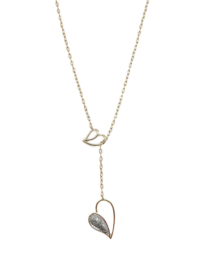 Gold plated sterling silver lariat necklace with pavé drop pendant photographed on a white background