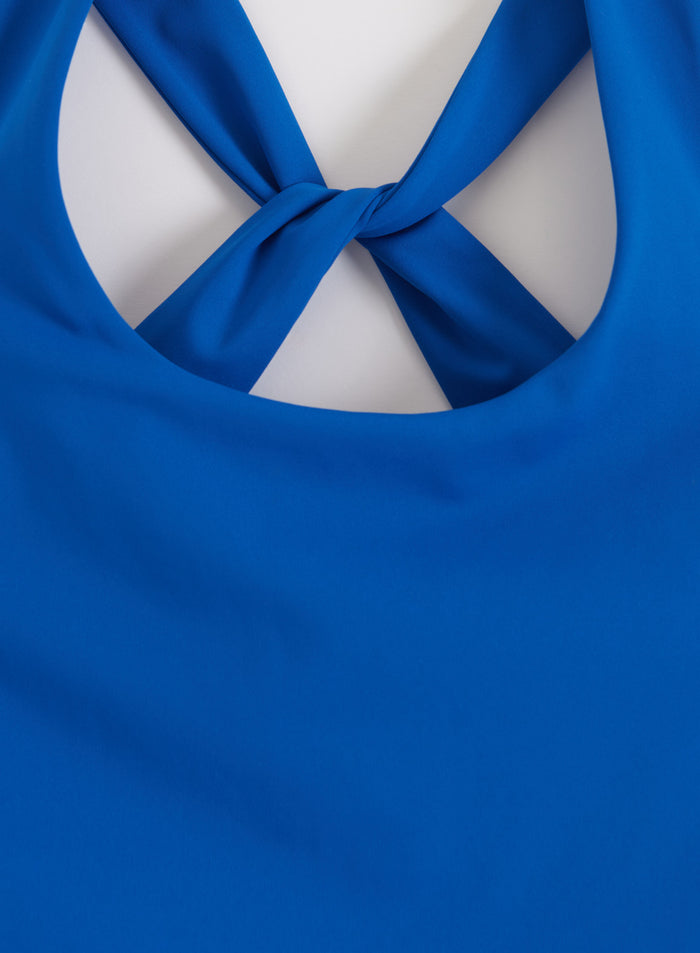 Asuurinsininen aim'n Lunar Running Singlet, jossa on kiertyvä selkäosa kierrätetystä teknisestä kankaasta.