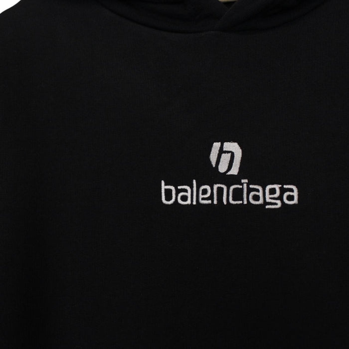 Balenciaga black and white cotton hoodie with sponsor logo and large fit.