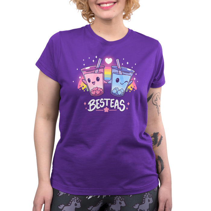 Premium Cotton T-shirt_TeeTurtle purple Besteas apparel featuring two bubble tea cups with happy faces, holding hands, surrounded by stars, with a rainbow in the background. Caption reads, "besteas".