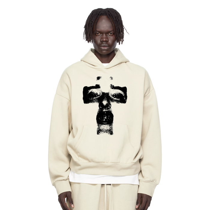 Birds Crossface Cream oversized hoodie, ultra-premium hoodie with crossface design, displayed on a hanger.