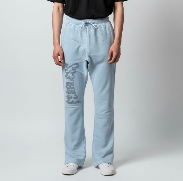 Black Pike Fearless rhinestone stacked sweatpants in light blue with rhinestone accents and a relaxed fit, casual streetwear style.