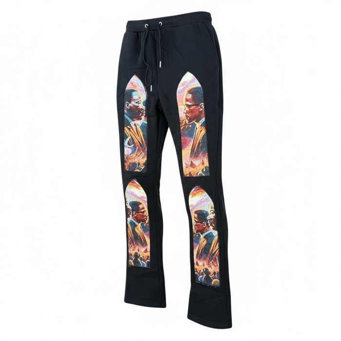 Black Pike Legends tapestry design stacked sweatpants in black with a relaxed fit and elastic waistband, casual athletic style.