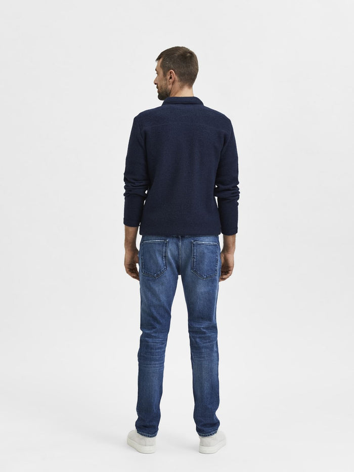Blue Mid Rise Distressed Leon Slim Jeans