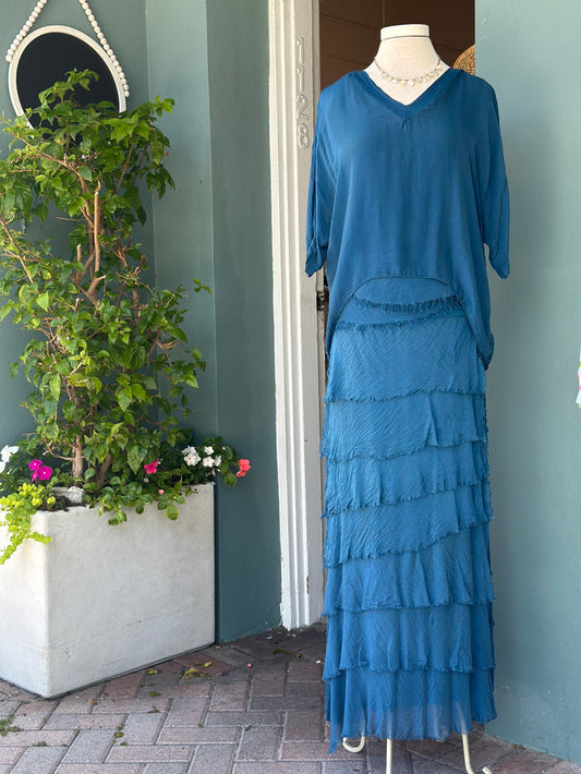 Briella Silk Skirt in Prussian Blue featuring flowing layered silk tiers, a comfortable stretch jersey waistband, and an elegant ankle-grazing silhouette. Made in Italy from lightweight washable silk for effortless movement and timeless style.