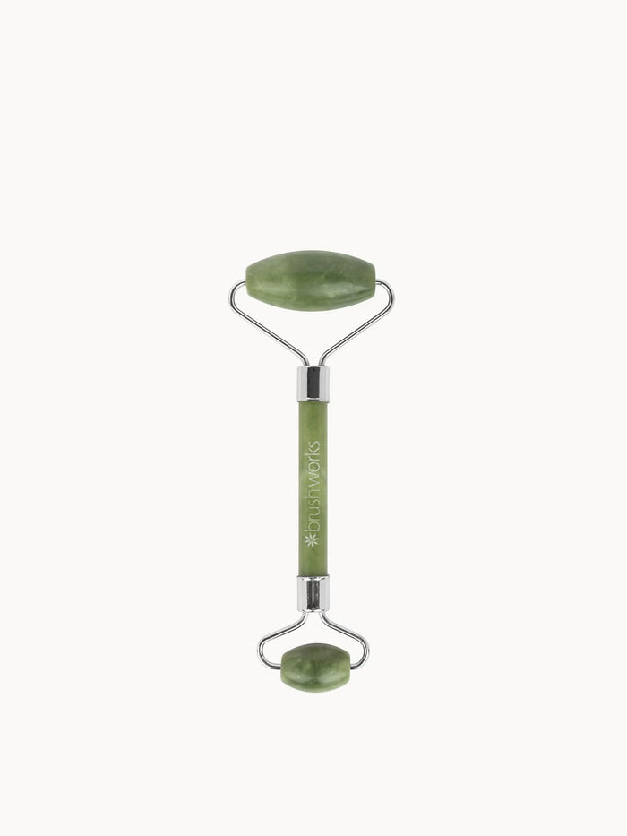Brushworks HD Jade Roller Face Massager for skin care, showing the jade roller tool with a sleek handle and smooth rolling surface.