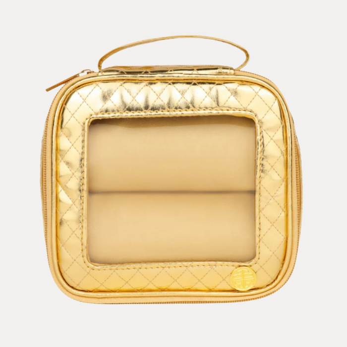 a gold jewelry case with a transparent window