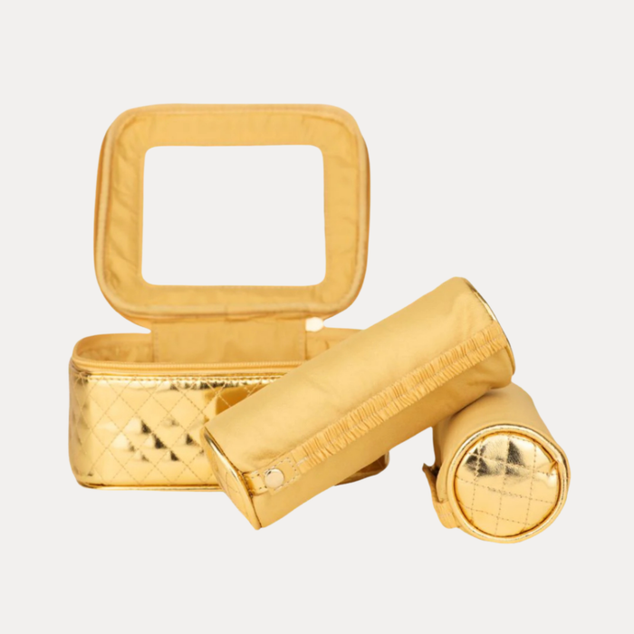 a gold pouch with a square top