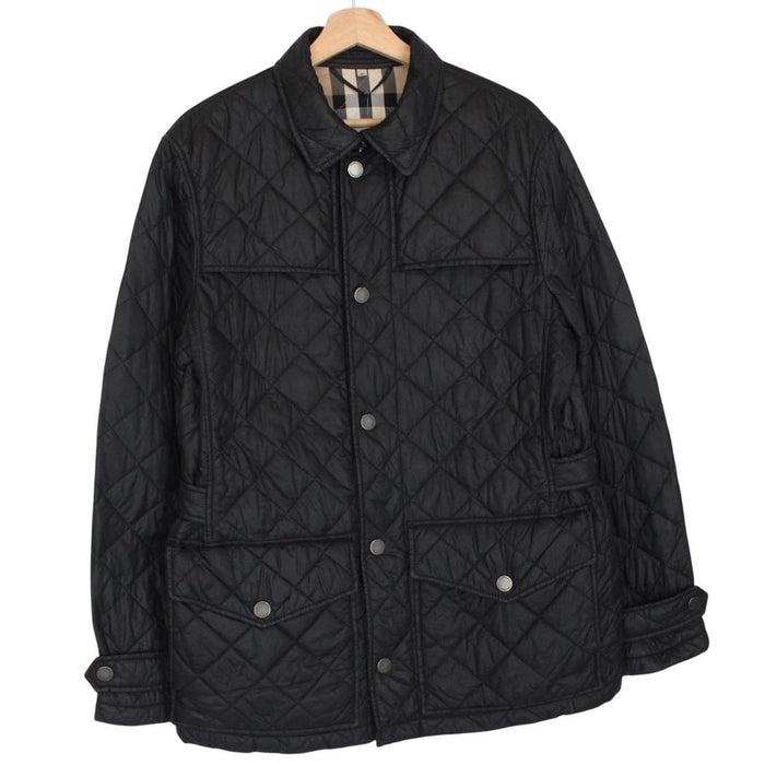 Burberry black quilted field jacket with Nova Check lining and diamond pattern.