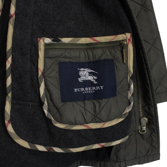 Burberry khaki green quilted field jacket with Nova Check pattern and logo details.
