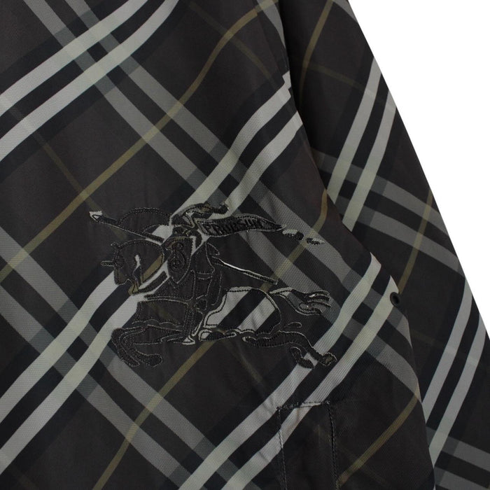 Burberry reversible jacket in dark grey and black with Nova Check pattern and full zip.