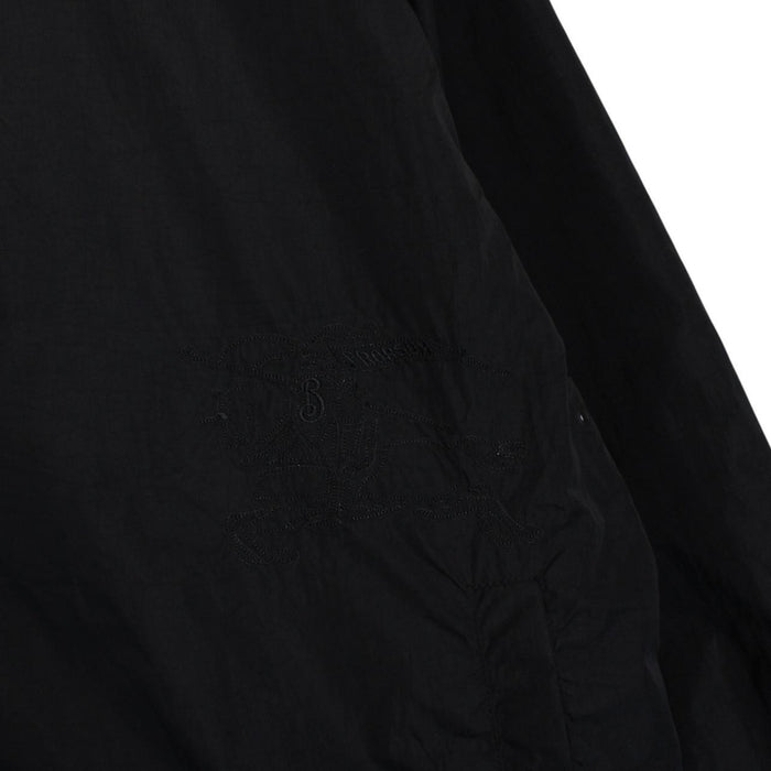 Burberry reversible jacket in dark grey and black with Nova Check pattern and full zip.