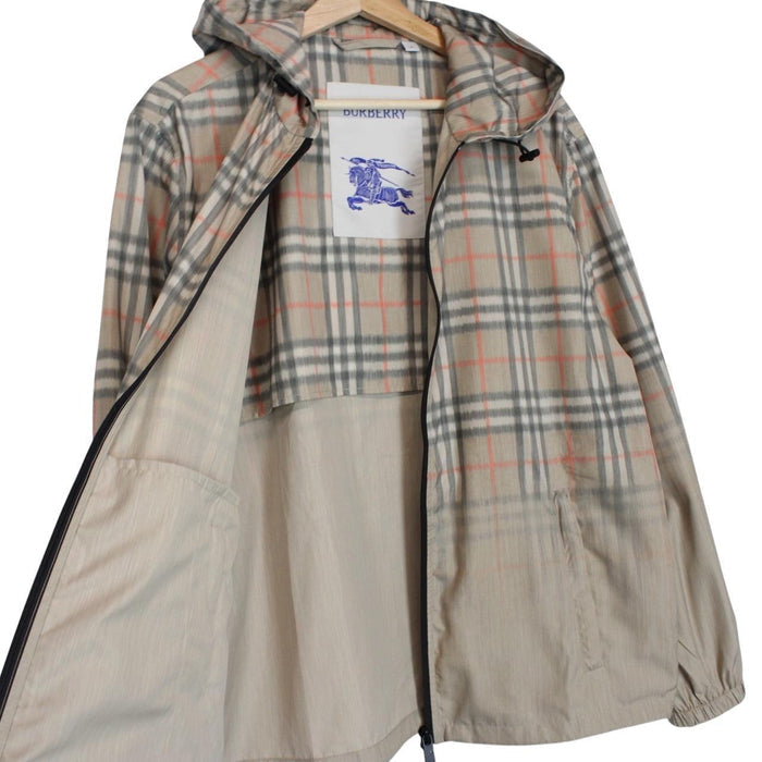 Burberry beige windbreaker jacket with Nova Check pattern and full zip hood.