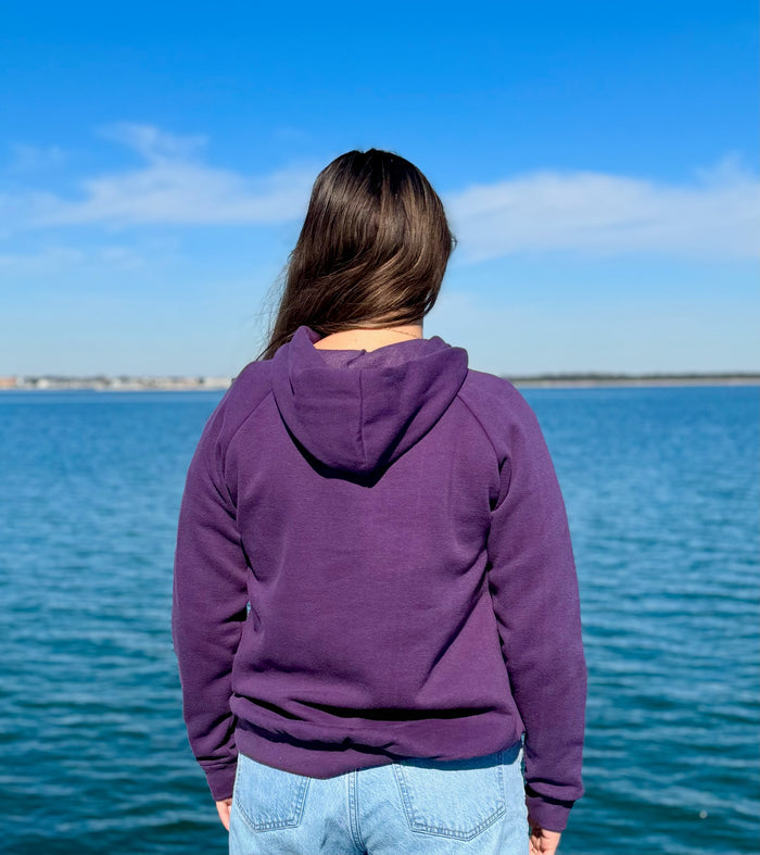 Women’s butterfly pullover hoodie with chest butterfly graphic, butterfly sleeve design, drawstring hood and ribbed trim at Ardor Boutique.