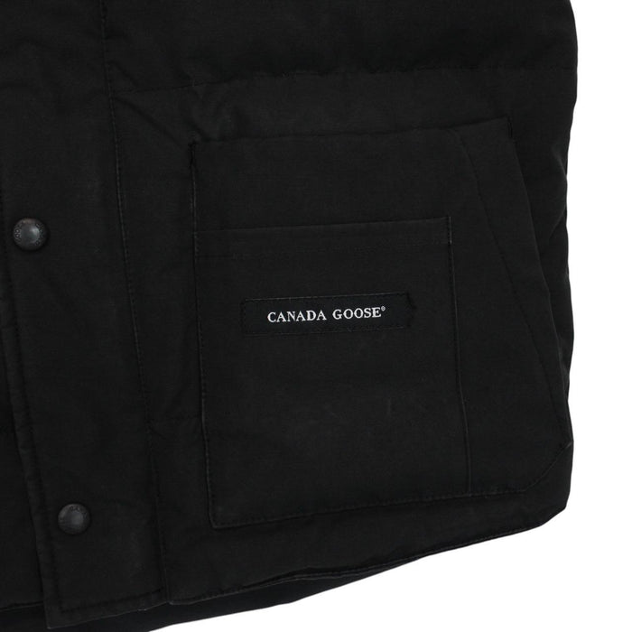 Canada Goose black down gilet with logo patch and original tags, very good condition.