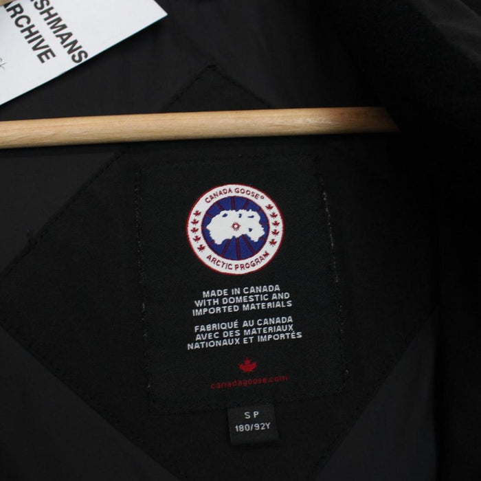 Canada Goose black down gilet with logo patch and original tags, very good condition.