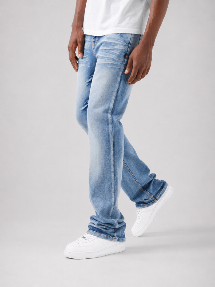 Copper Rivet Cross Hatch flare denim jeans in dark wash with contrasting stitching and distressed details.