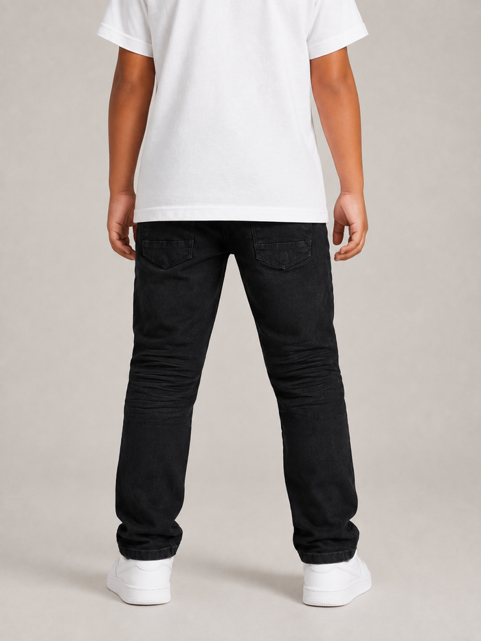 Black Copper Rivet Kids denim jeans with rip and repair details, featuring a classic kids' denim style and copper rivet accents.