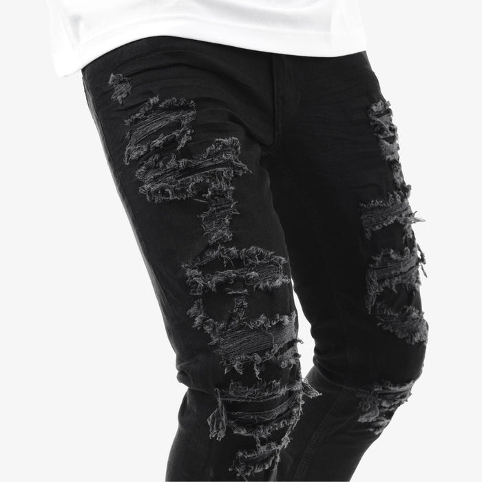 Black Copper Rivet Rip & Repair denim jeans featuring distressed details and copper rivet accents.