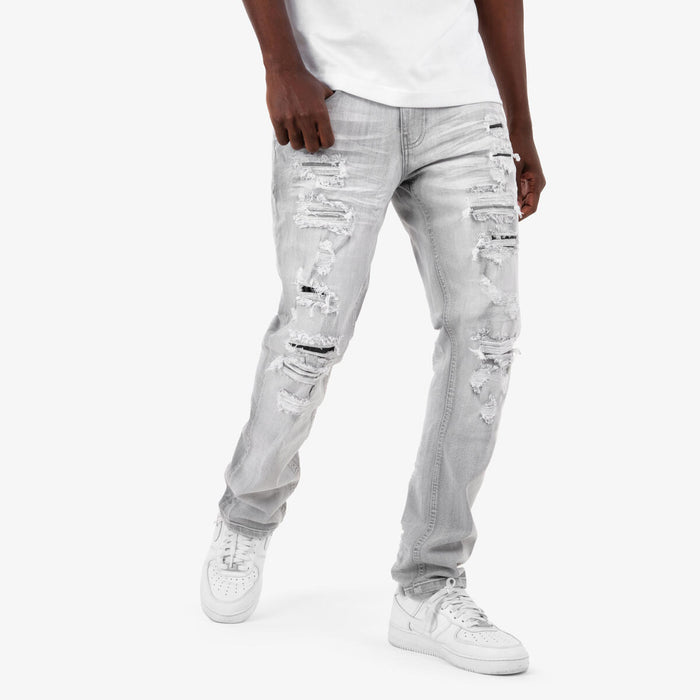 Copper Rivet 'Rip & Repair' grey denim jeans with distressed details and copper rivet accents, stylish and durable.