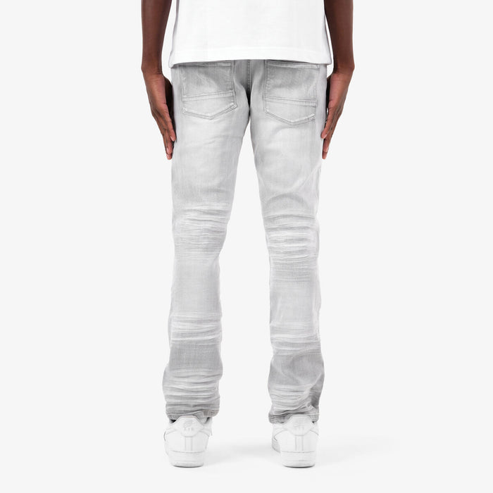 Copper Rivet Rip & Repair grey denim jeans with distressed details and copper rivet accents.