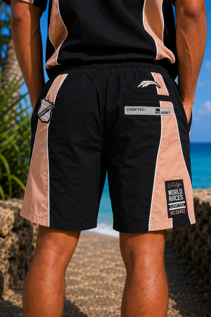 Black Crafted nylon shorts with a relaxed fit and adjustable waistband, suitable for casual wear and outdoor activities.