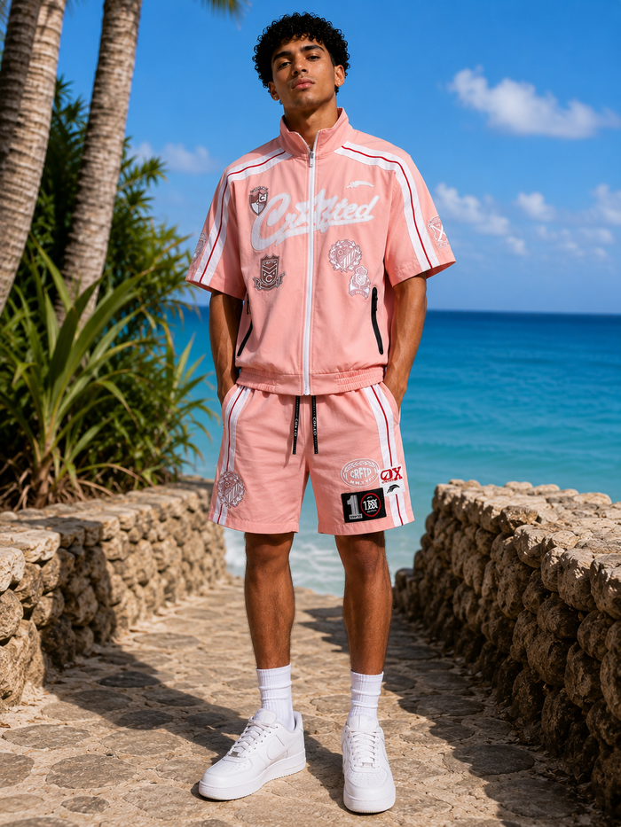 Pink Crafted nylon track suit zip-up jacket, featuring a sleek design and front zipper, perfect for athletic or casual wear.