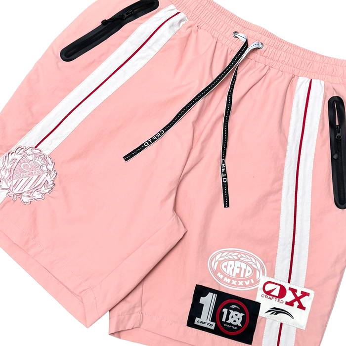 Pink Crafted nylon shorts with a relaxed fit, featuring a smooth waistband and casual style for comfortable summer wear.