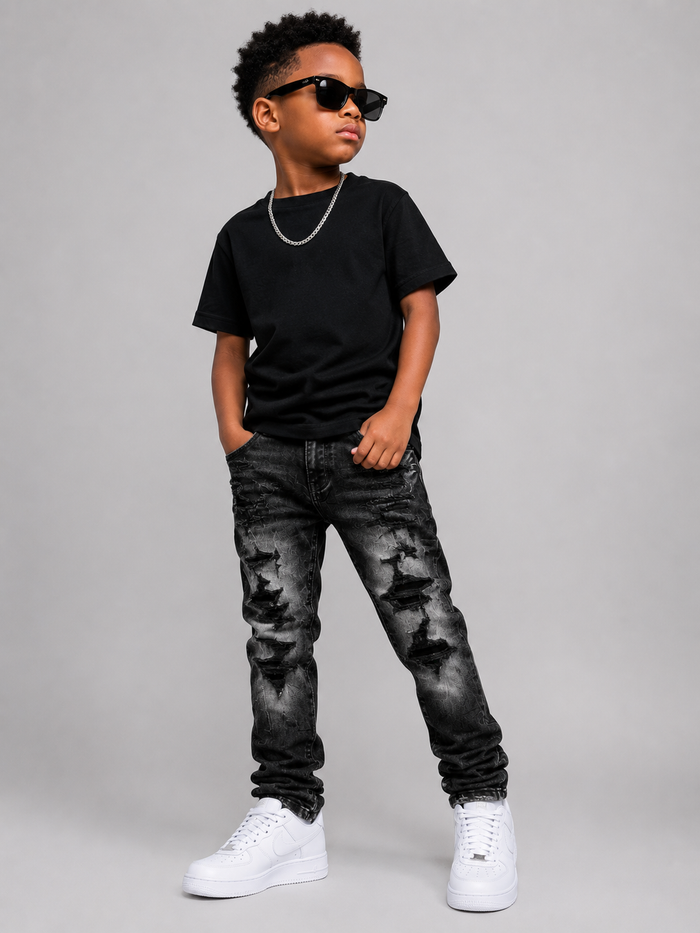 Jordan Craig Kids shredded black denim jeans showing distressed details and casual fit for children.