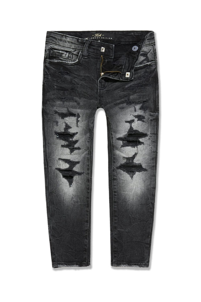 Jordan Craig Kids black shredded denim jeans with distressed details and shreds, stylish kids' denim pants in black shadow.