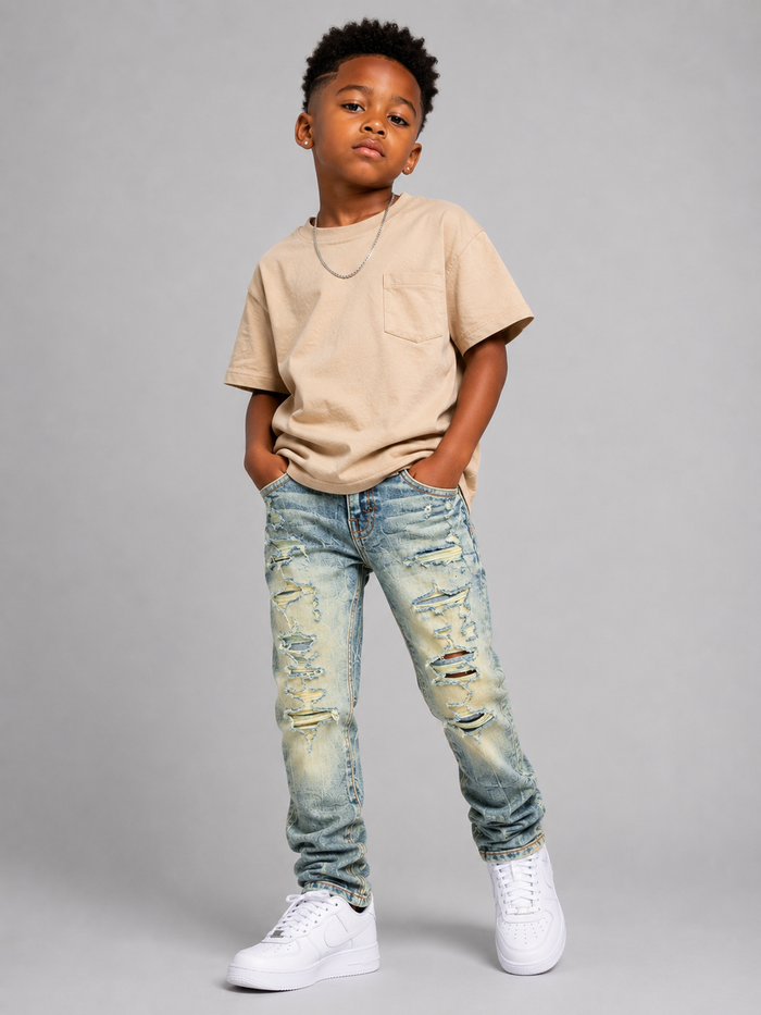 Jordan Craig Kids shredded denim jeans in desert color, featuring distressed details and a casual kids' denim style.