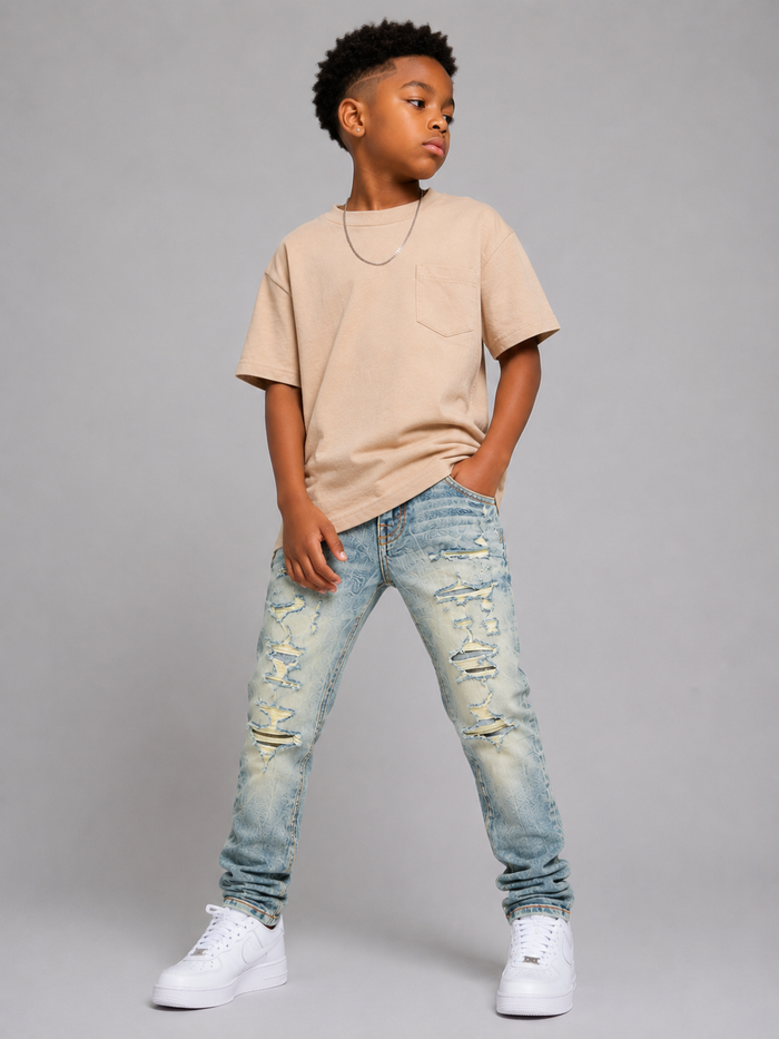 Jordan Craig Kids shredded denim jeans in desert color with distressed details, designed for a casual and trendy kids' outfit.