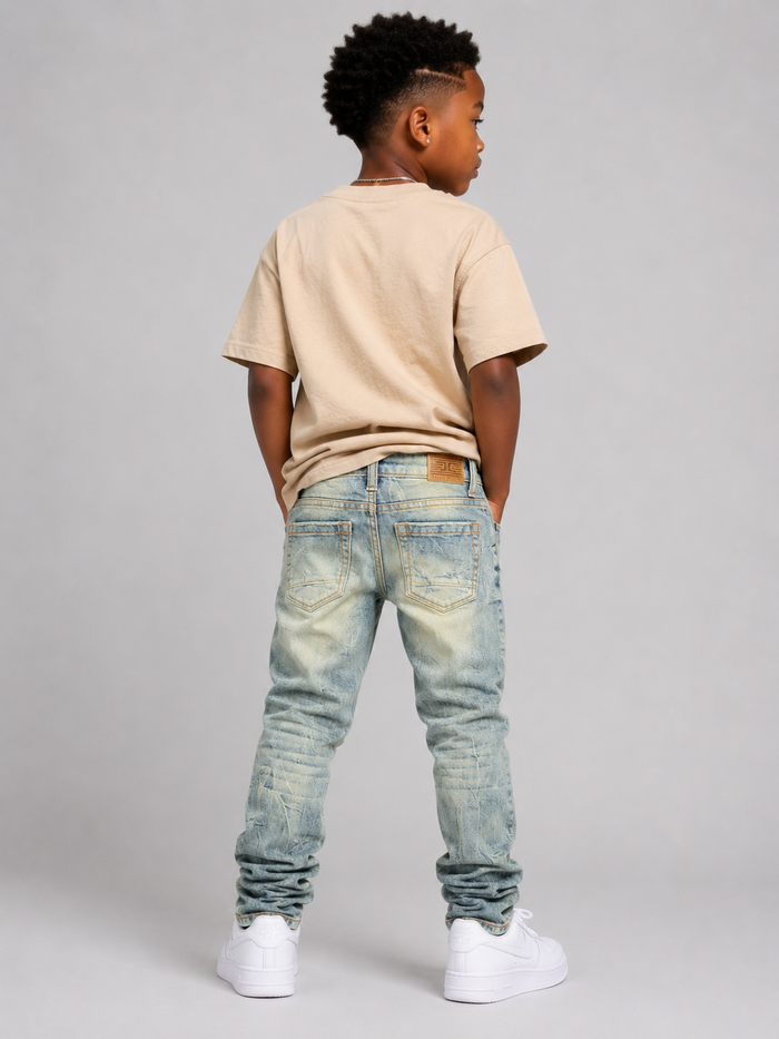 Jordan Craig Kids shredded denim jeans in desert color, featuring distressed details and a trendy kids' denim style.