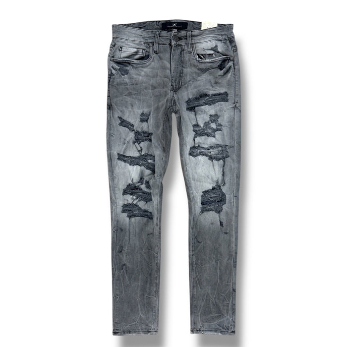 Jordan Craig Sean Denim with shreds in smoked grey, showcasing distressed denim style and textured fabric.