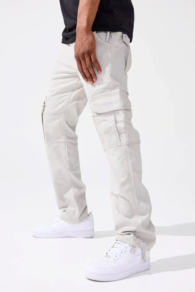 Jordan Craig Xavier OG cargo pants in denim featuring multiple pockets and relaxed fit, shown on a model.